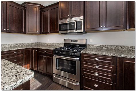 espresso cabinets with stain steel slate appliances|espresso kitchen cabinets black granite.